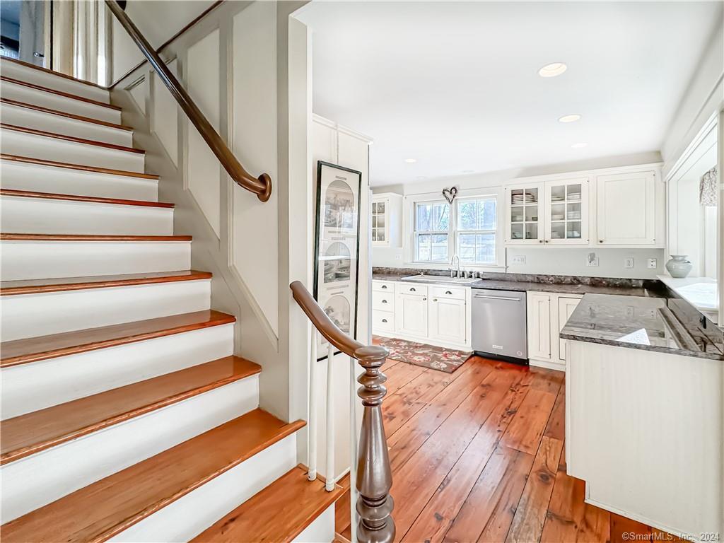 414 Riverside Avenue Westport, CT 06880 - Photo 5 of 40 a view of a kitchen with wooden floor and electronic appliances