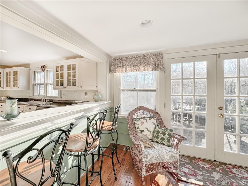 414 Riverside Avenue Westport, CT 06880 - Photo 9 of 40 a view of a dining room with furniture and wooden floor