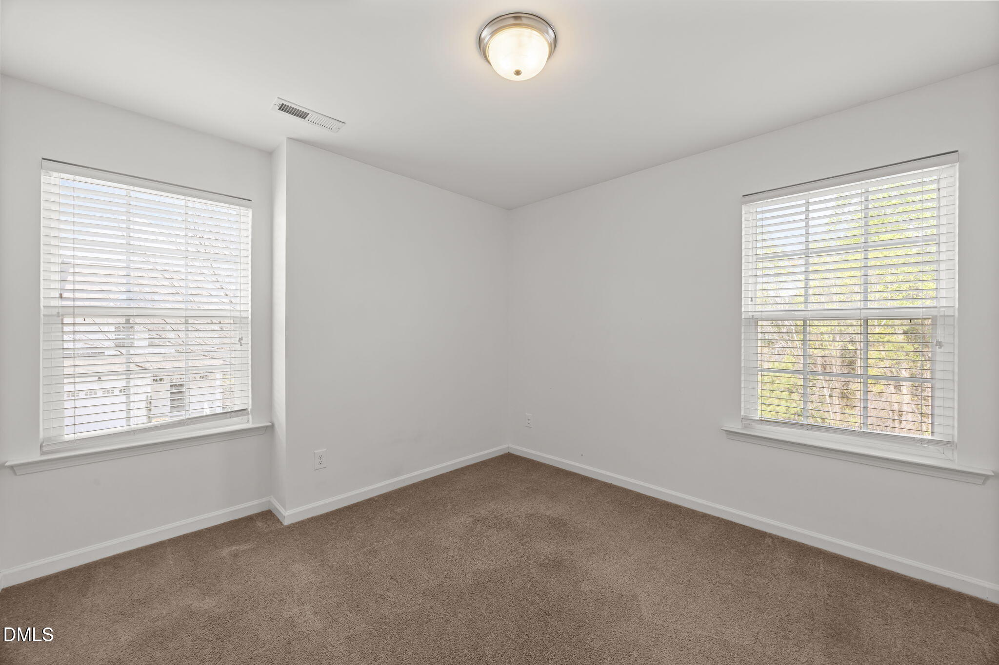 401 Stone Flower Lane Raleigh, NC 27603 - Photo 16 of 28 an empty room with a window