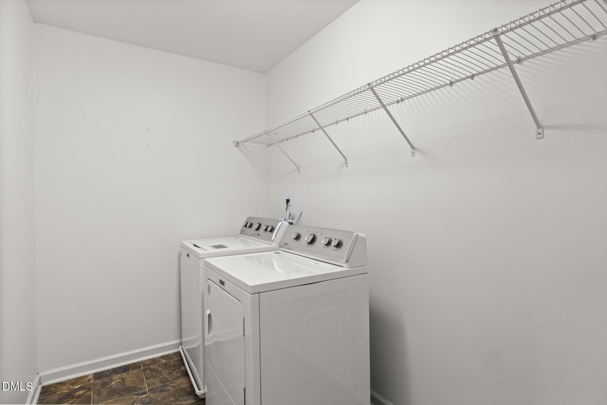 401 Stone Flower Lane Raleigh, NC 27603 - Photo 18 of 28 a utility room with dryer and washer