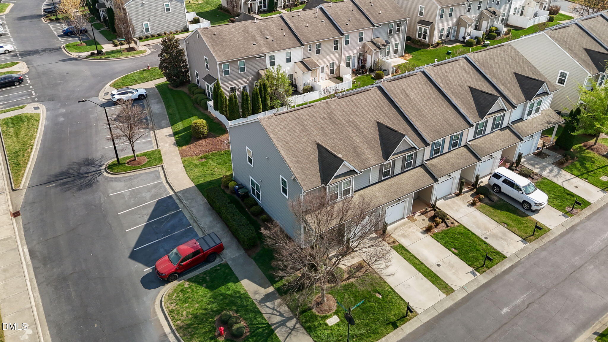 401 Stone Flower Lane Raleigh, NC 27603 - Photo 22 of 28 an aerial view of multiple houses with yard