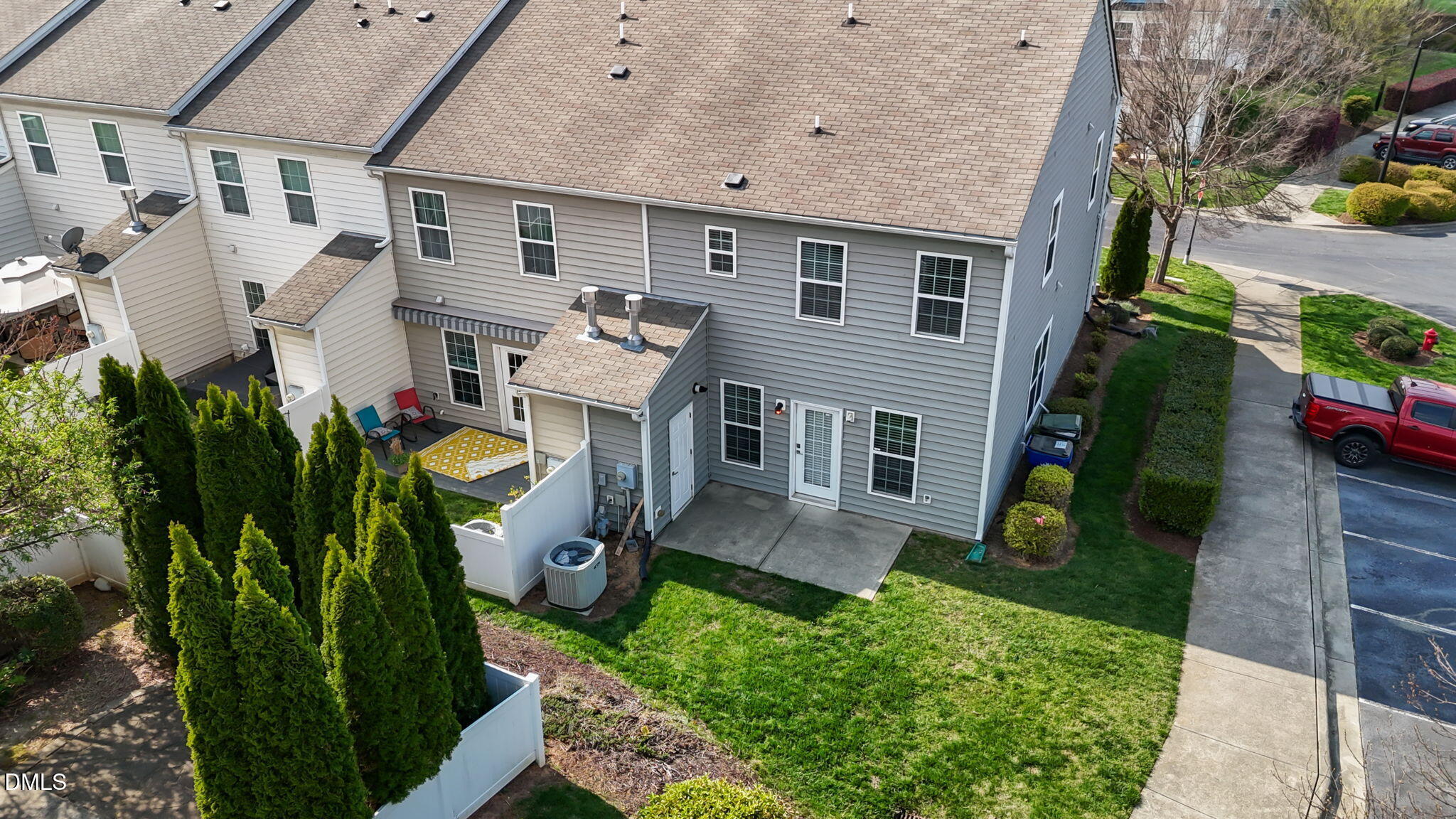 401 Stone Flower Lane Raleigh, NC 27603 - Photo 23 of 28 a aerial view of a house with a yard and potted plants