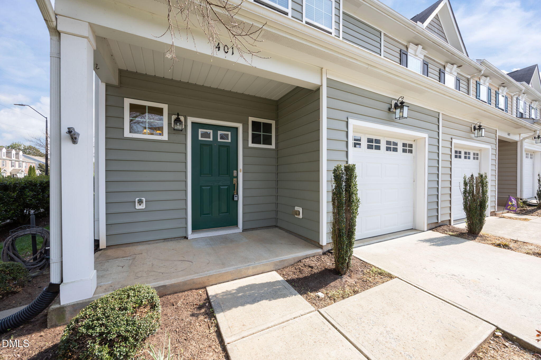 401 Stone Flower Lane Raleigh, NC 27603 - Photo 2 of 28 a view of a building entrance