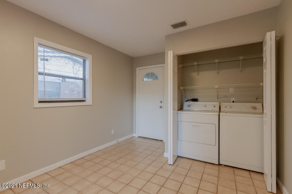 7447 Wheat Road Jacksonville, FL 32244 - Photo 17 of 42 a view of a storage & utility room