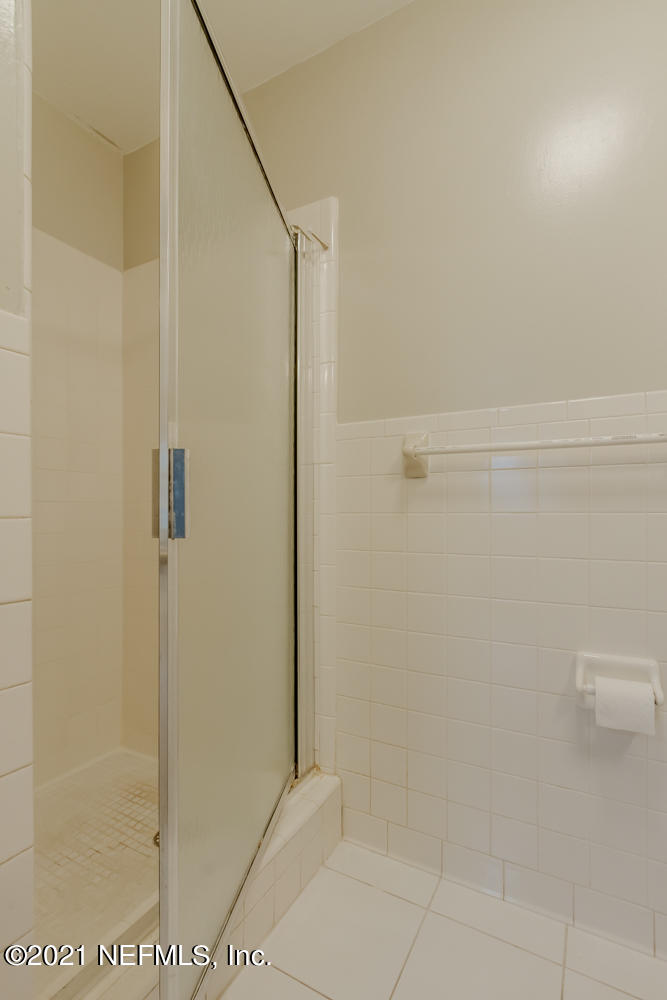 7447 Wheat Road Jacksonville, FL 32244 - Photo 31 of 42 a bathroom with a shower