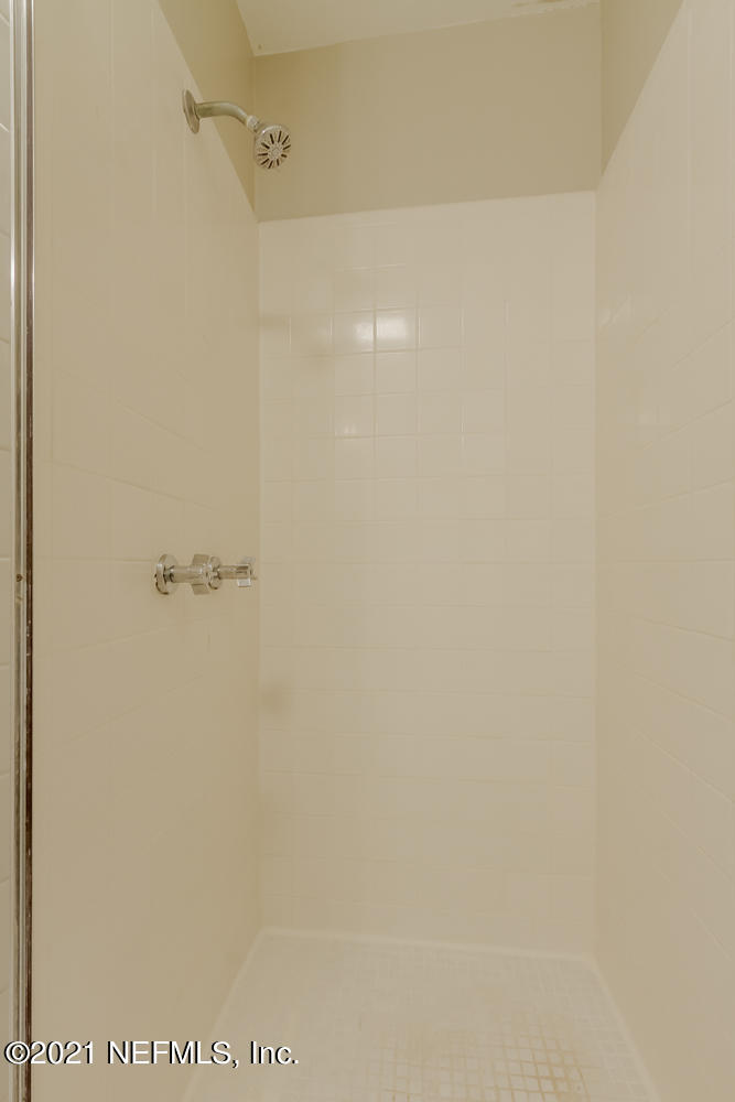 7447 Wheat Road Jacksonville, FL 32244 - Photo 32 of 42 a close up of a shower