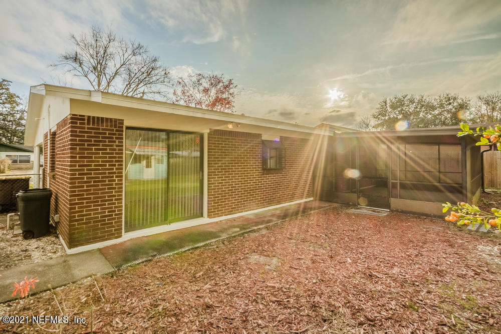 7447 Wheat Road Jacksonville, FL 32244 - Photo 39 of 42 a backyard of a house