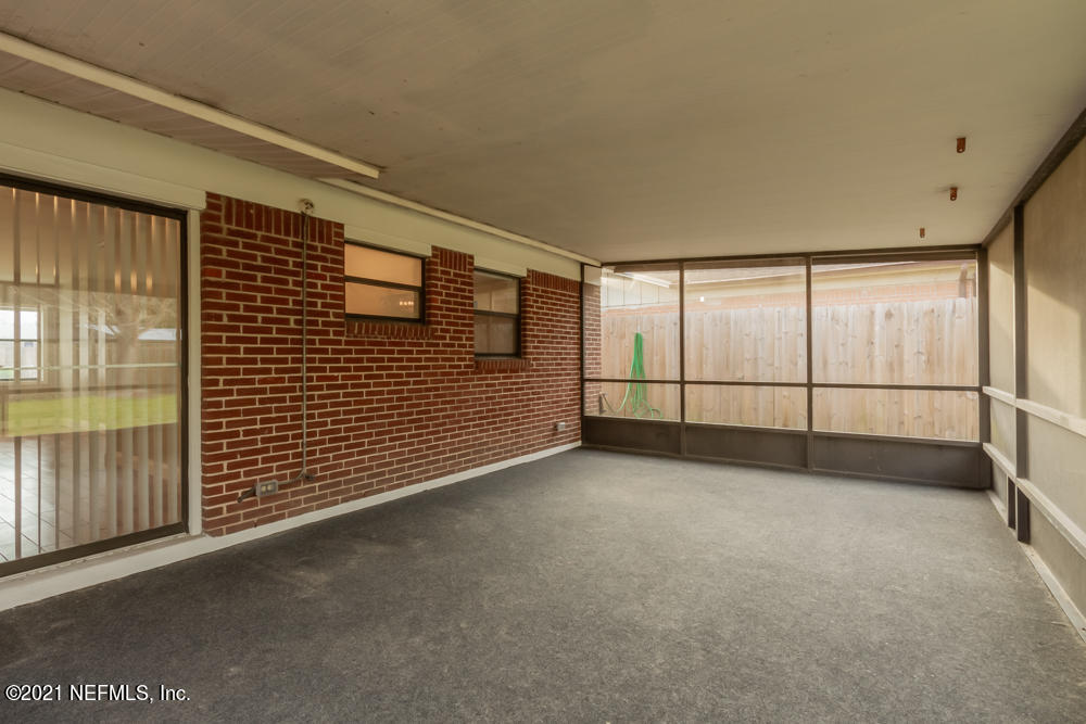 7447 Wheat Road Jacksonville, FL 32244 - Photo 42 of 42 a view of an empty room with a window
