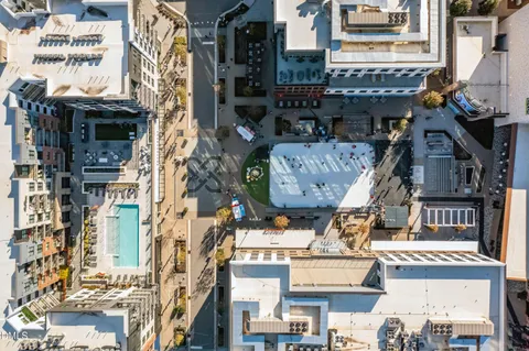 a view of building with glass windows