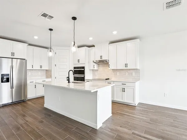 $562,420 | 1713 Draughton Drive, Zephyrhills, FL 33541