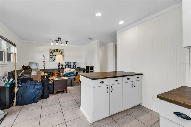 a workspace with furniture and a window