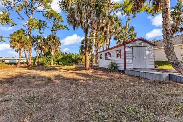 an aerial view of residential building with parking space