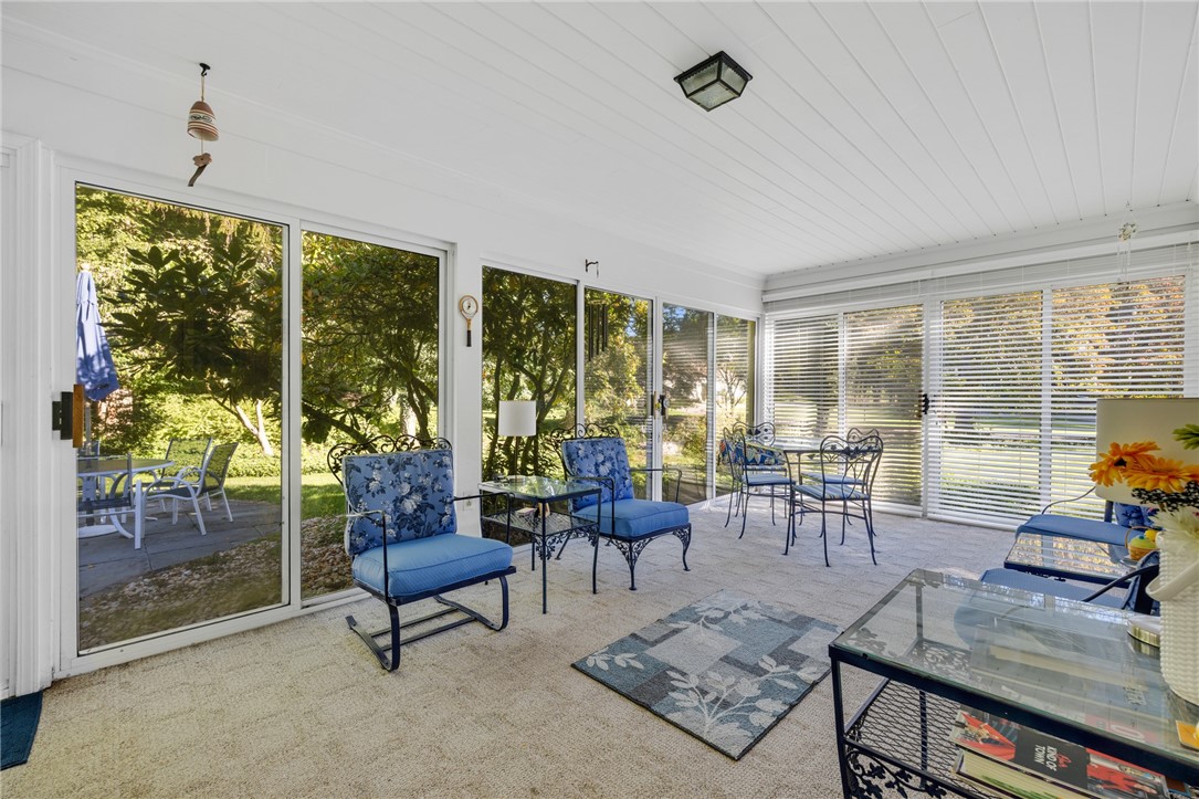 10 New England Drive Pittsford, NY 14618 - Photo 15 of 42 3 season enclosed rear porch!
