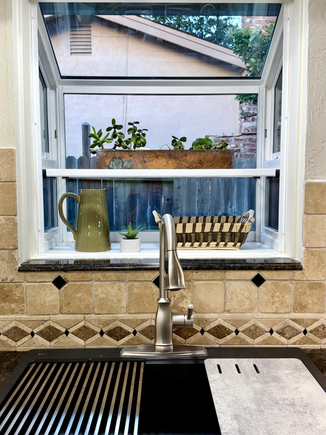 5706 Jeff Way Carmichael, CA 95608 - Photo 16 of 48 New large singke basin sink and kitchen window box.