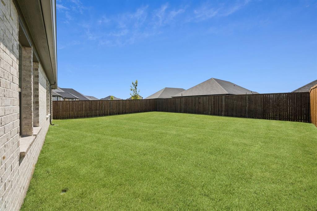 6628 Dusty Rdg Road Fort Worth, TX 76123 - Photo 27 of 27 Yard in the Heisman home plan by Trophy Signature Homes – REPRESENTATIVE PHOTO