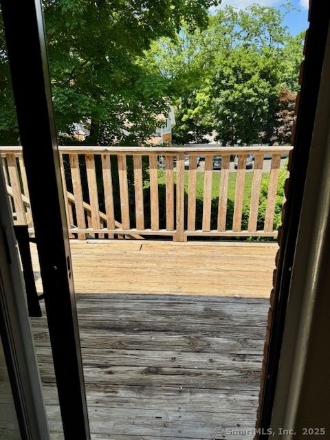 153 Main Street, Unit 2 East Hampton, CT 06424 - Photo 8 of 33 Looking out from the bedroom to the deck