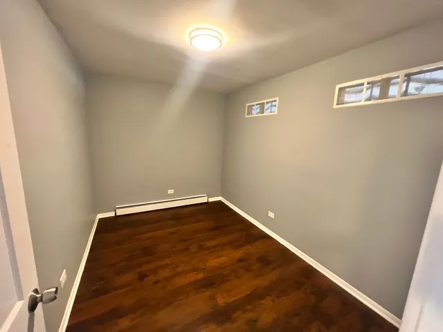 a view of small space with wooden floor