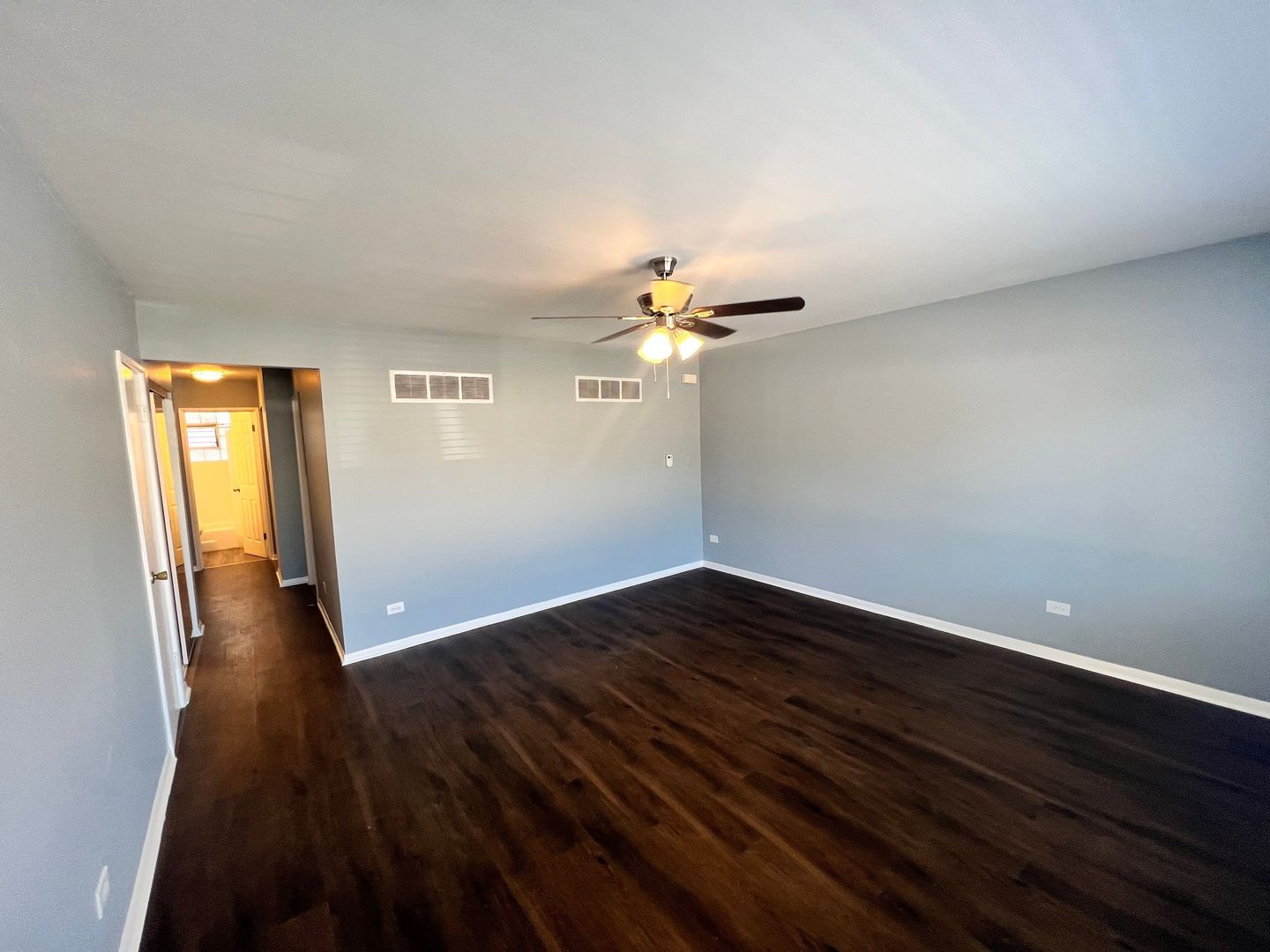 2657 West 47th Street, Unit 6 Chicago, IL 60632 - Photo 4 of 18 a view of empty room with wooden floor