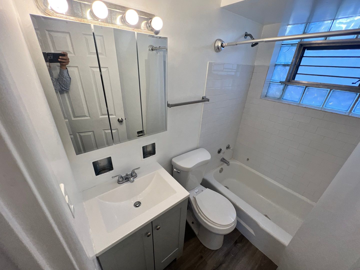 2657 West 47th Street, Unit 6 Chicago, IL 60632 - Photo 8 of 18 a bathroom with a sink a toilet and shower
