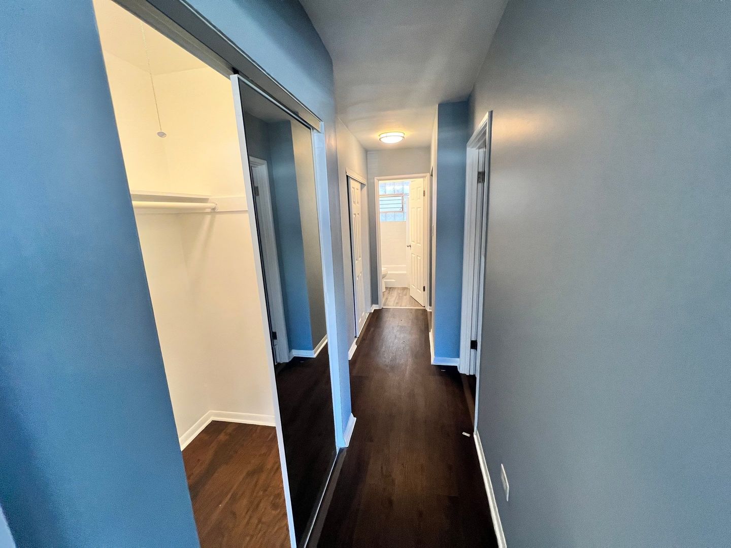 2657 West 47th Street, Unit 6 Chicago, IL 60632 - Photo 10 of 18 a view of a hallway with wooden floor and stairs