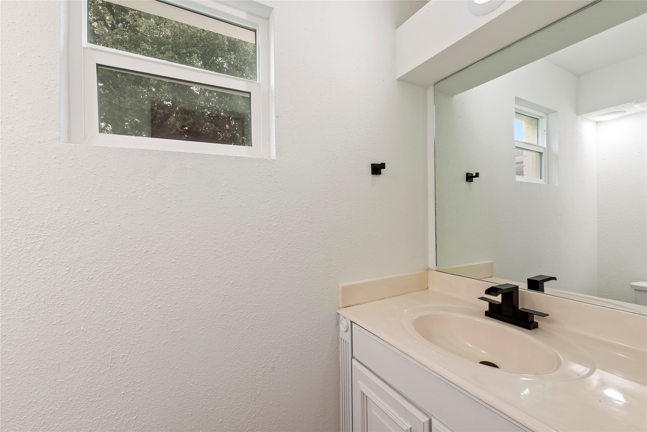 4315 Brookhead Trail Houston, TX 77066 - Photo 12 of 29 a bathroom with a sink and a mirror