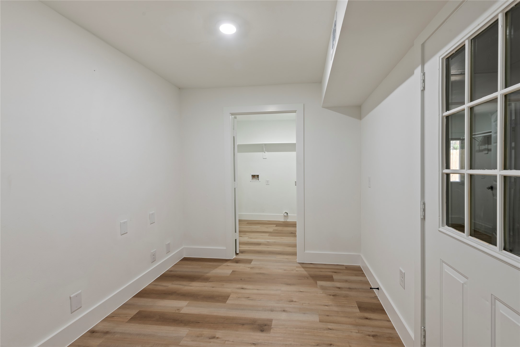 4315 Brookhead Trail Houston, TX 77066 - Photo 13 of 29 a view of a hallway with wooden floor