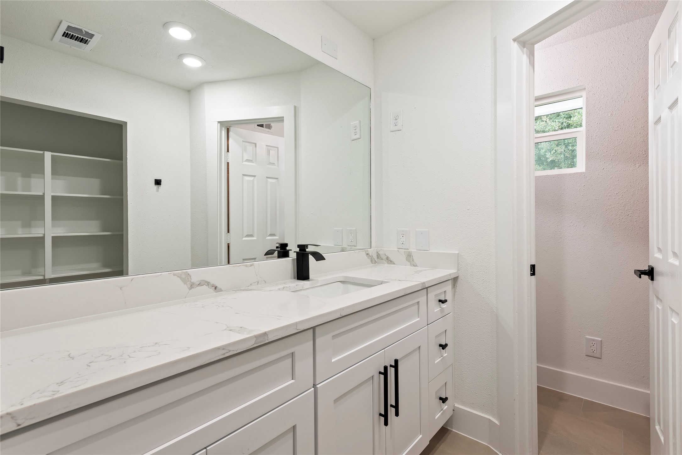 4315 Brookhead Trail Houston, TX 77066 - Photo 19 of 29 a bathroom with a sink and a mirror