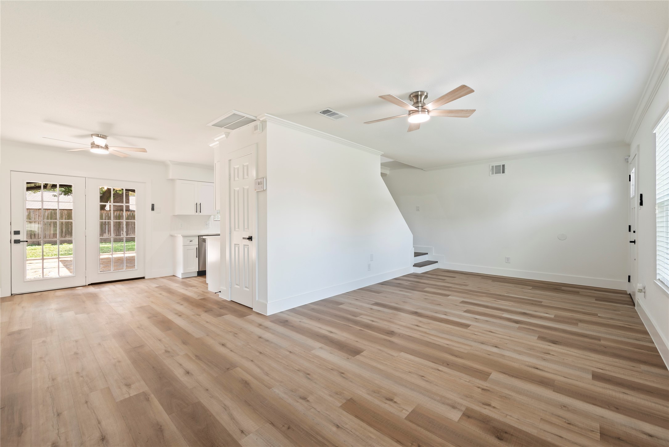 4315 Brookhead Trail Houston, TX 77066 - Photo 7 of 29 a view of empty room with wooden floor and ceiling fan