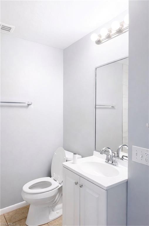 5364 16th Place Southwest, Unit H3 Naples, FL 34116 - Photo 6 of 8 Bathroom featuring vanity and light tile patterned floors