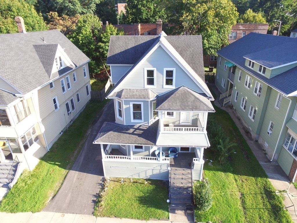 9 Leete Street Springfield, MA 01108 - Photo 5 of 23 a front view of a house with a yard