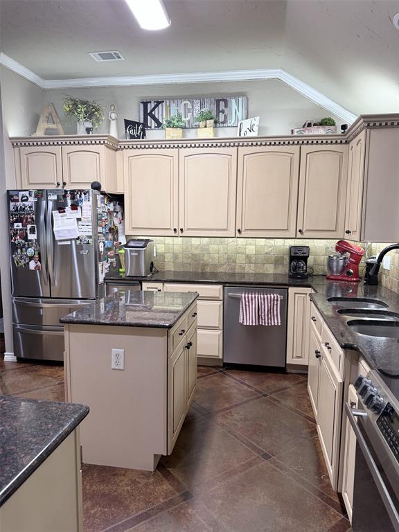 313 An County Road, Unit 2145 Palestine, TX 75801 - Photo 36 of 40 Kitchen featuring an island, recessed lighting, stainless steel appliances, and dark countertops