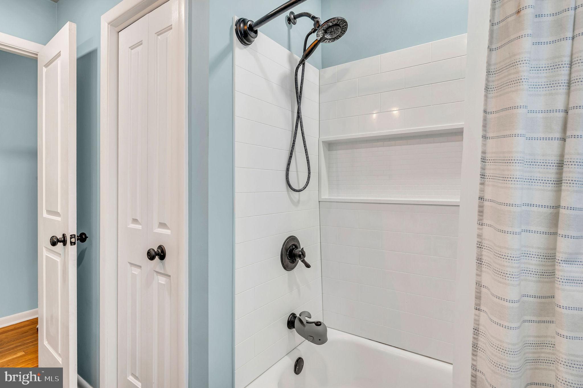 2707 Broder Street Southwest Allentown, PA 18103 - Photo 13 of 32 a bathroom with a shower