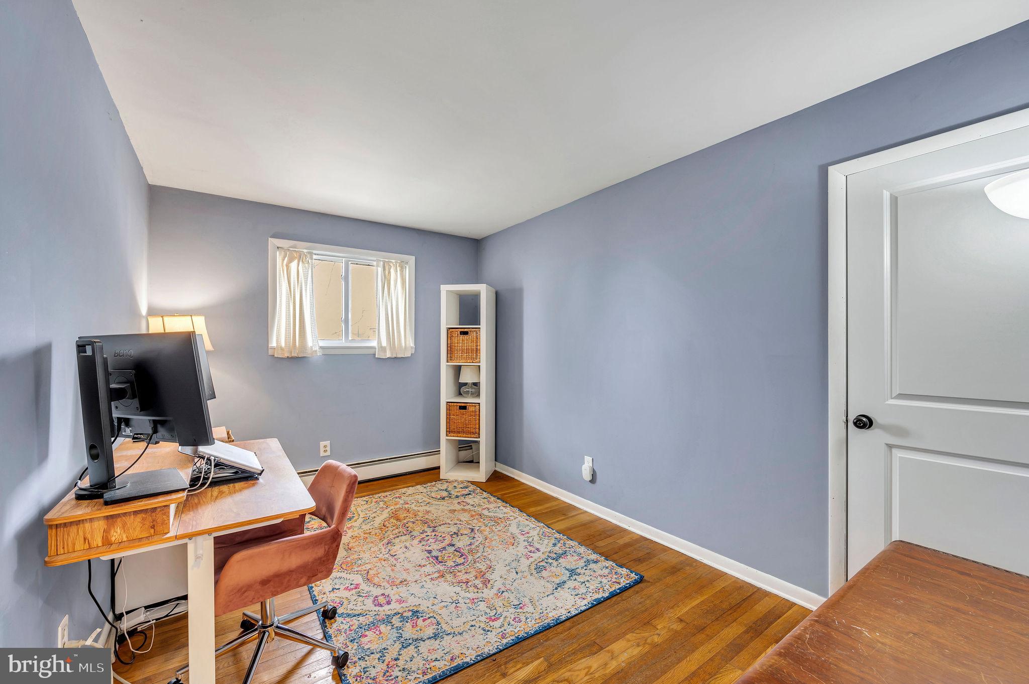 2707 Broder Street Southwest Allentown, PA 18103 - Photo 16 of 32 a view of a livingroom with furniture and a workspace