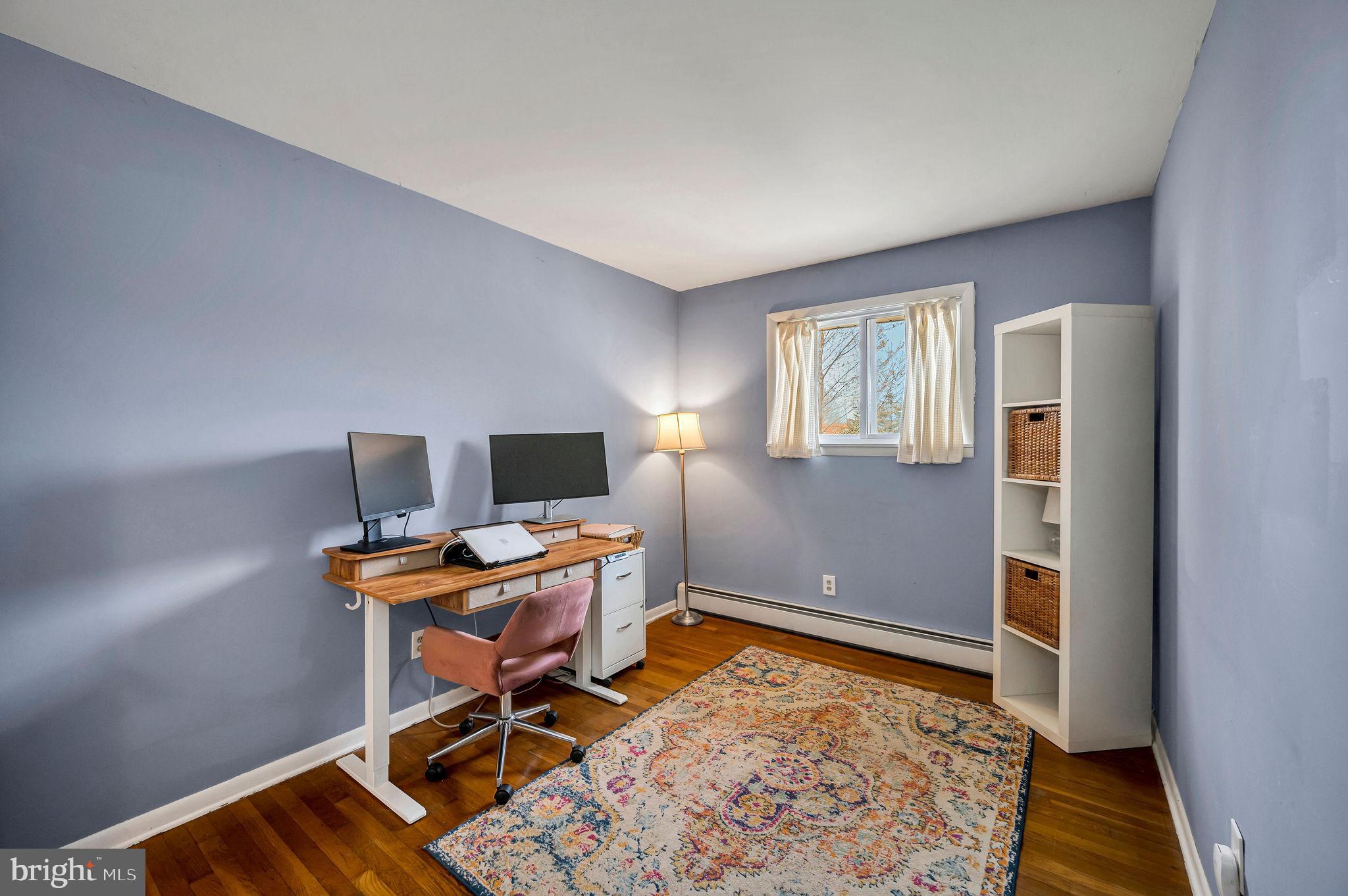2707 Broder Street Southwest Allentown, PA 18103 - Photo 17 of 32 a workspace with furniture and lamp on desk