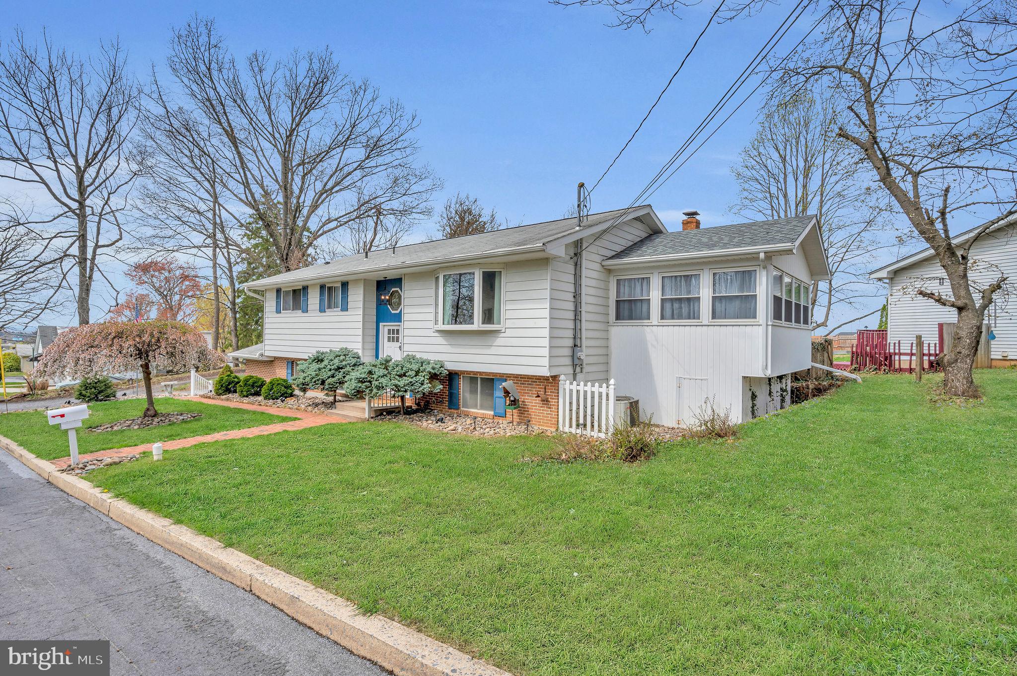 2707 Broder Street Southwest Allentown, PA 18103 - Photo 2 of 32 a front view of house with yard and green space