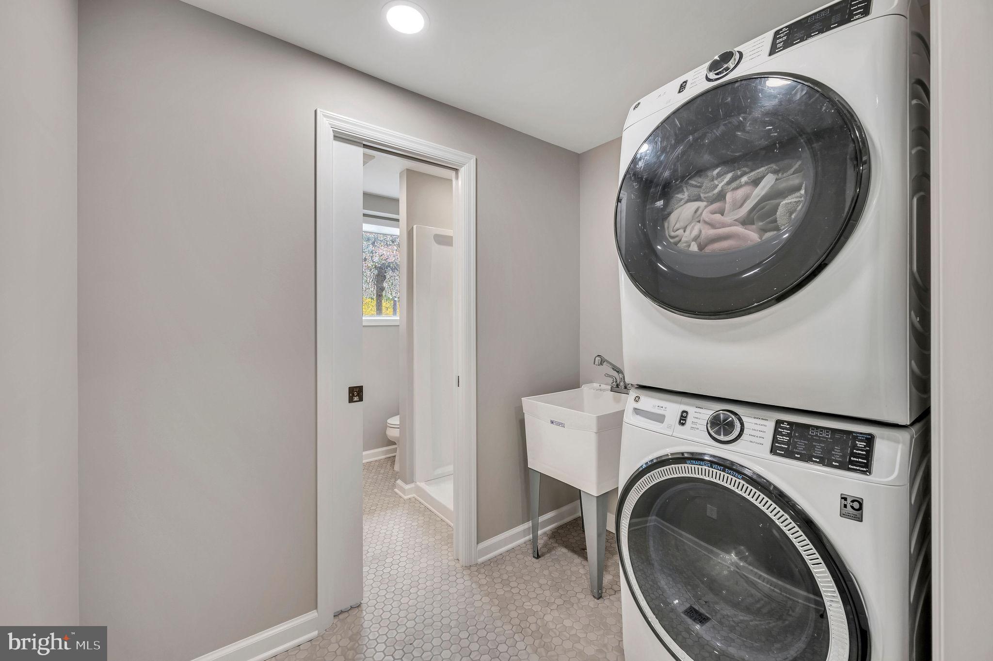 2707 Broder Street Southwest Allentown, PA 18103 - Photo 27 of 32 a view of a hallway with washer and dryer