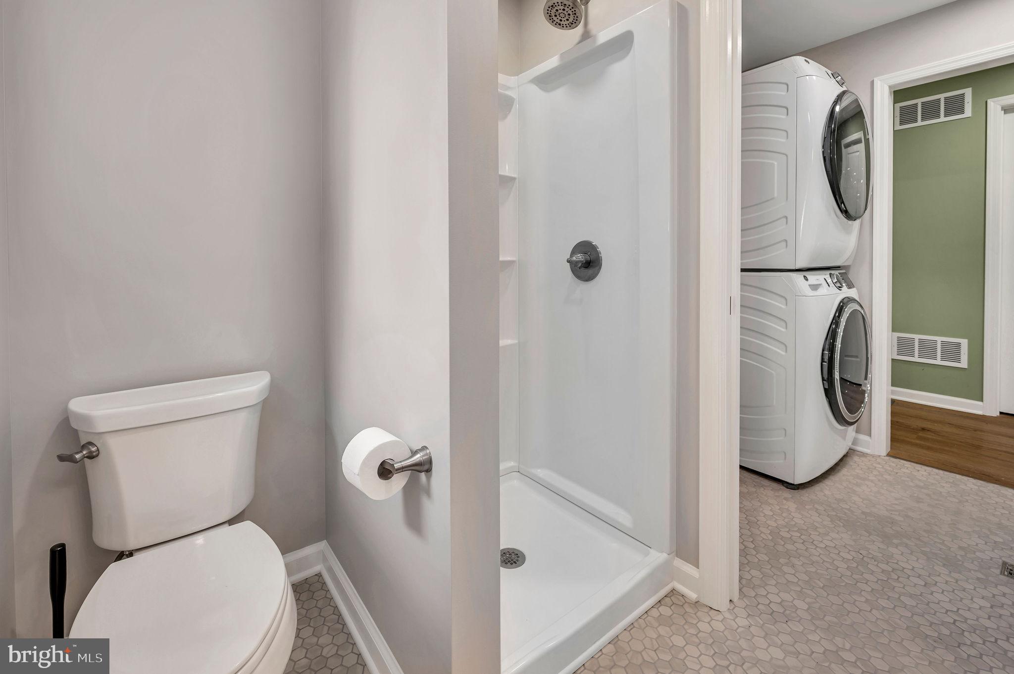 2707 Broder Street Southwest Allentown, PA 18103 - Photo 30 of 32 a white toilet sitting next to a bathroom