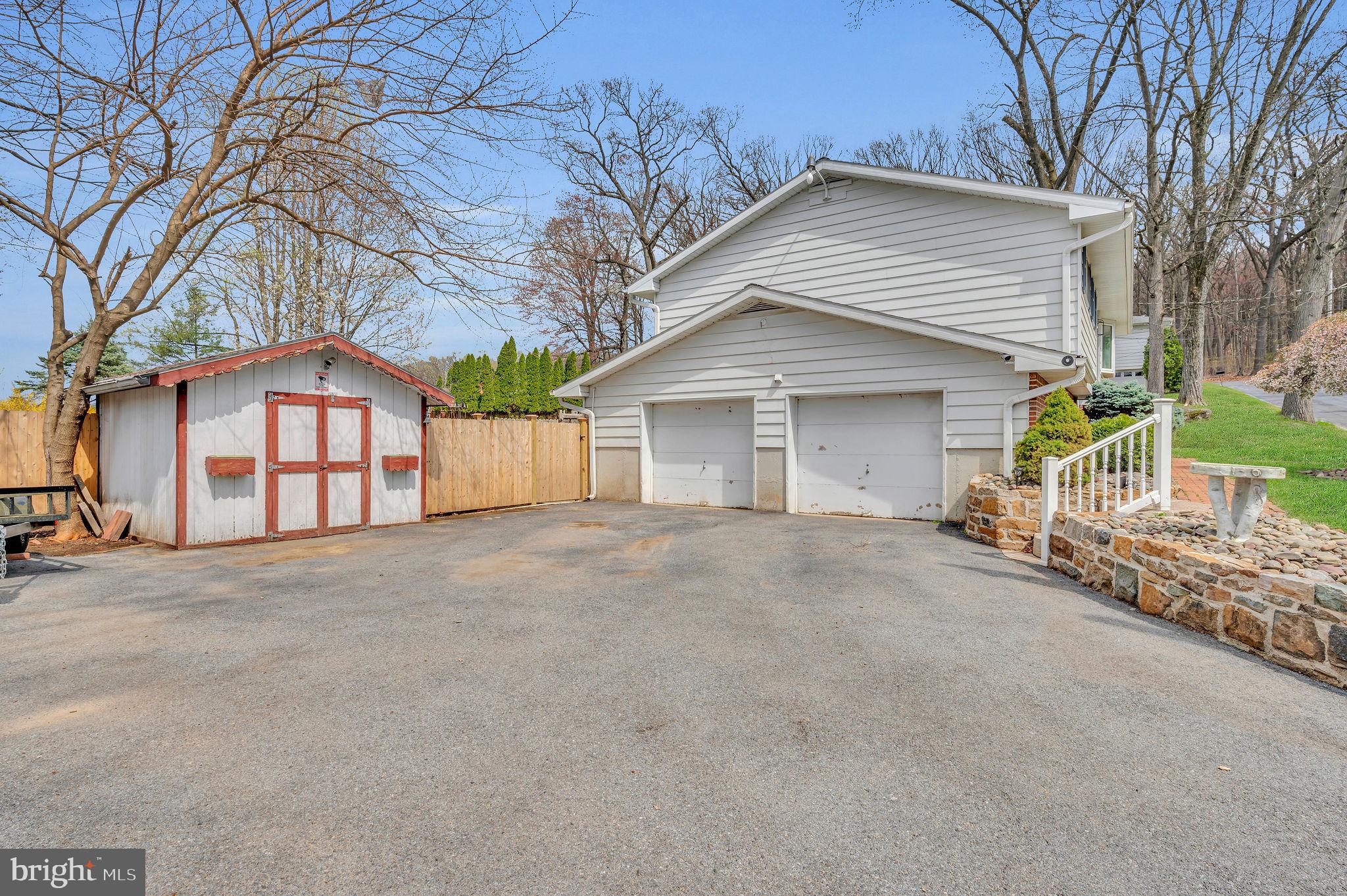 2707 Broder Street Southwest Allentown, PA 18103 - Photo 4 of 32 a view of a house with a yard and garage