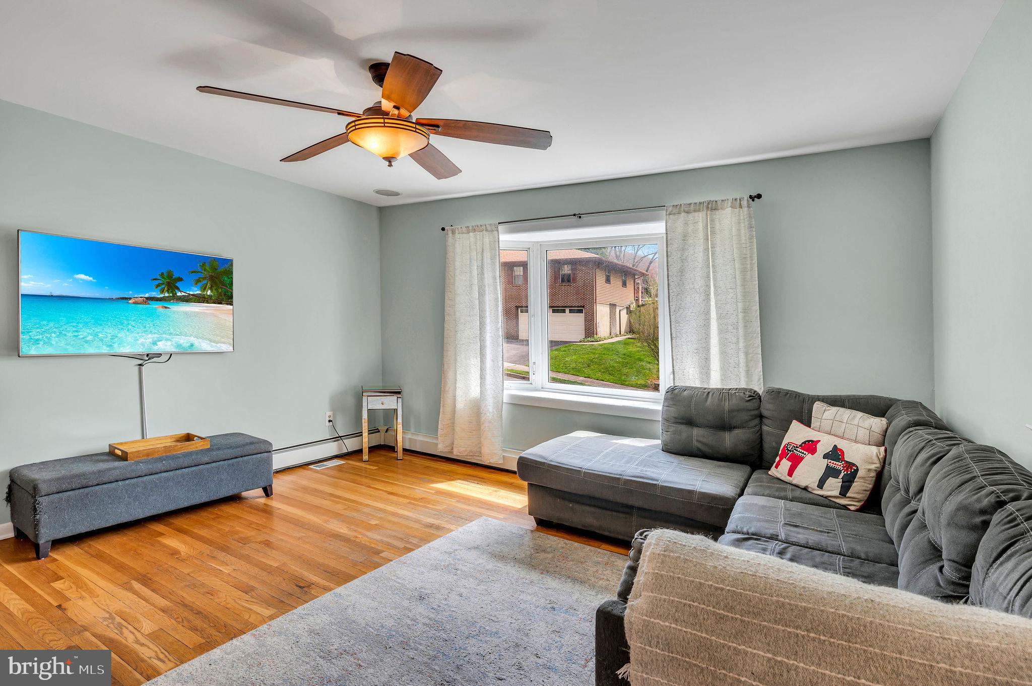 2707 Broder Street Southwest Allentown, PA 18103 - Photo 5 of 32 a living room with furniture and a window