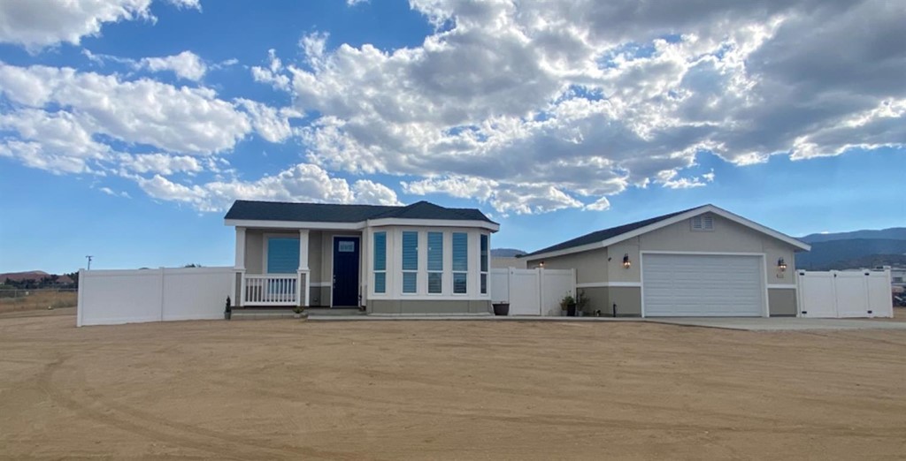 4965 Cambria Road Phelan, CA 92371 - Photo 1 of 1 front view of a house with a dry yard
