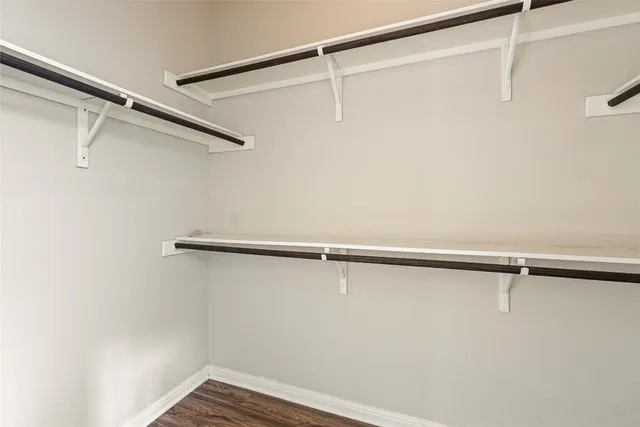 a view of a room with racks on the wall