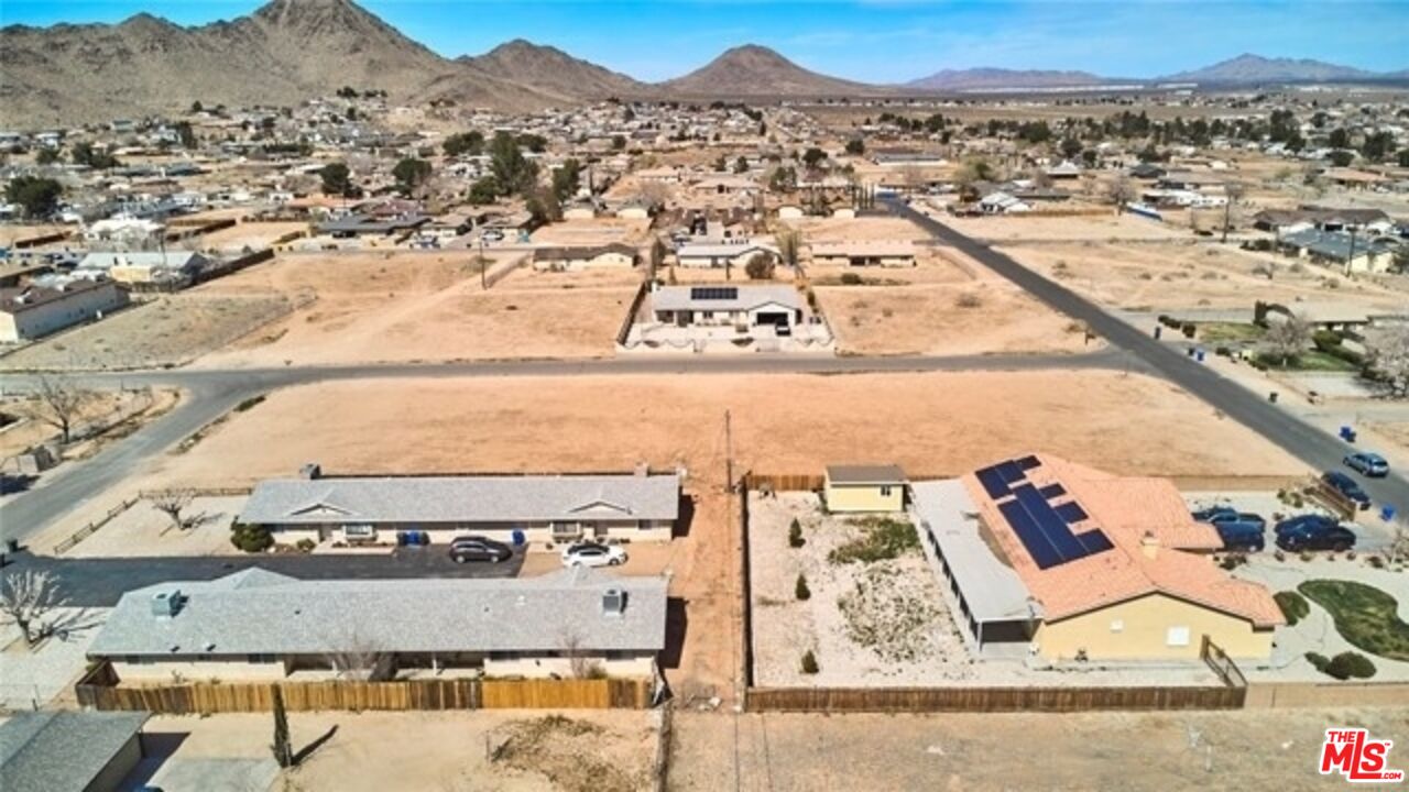 0 Straight Arrow Road Apple Valley, CA 92307 - Photo 5 of 26 an aerial view of residential houses with outdoor space