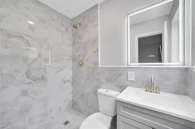 a bathroom with a sink and a toilet