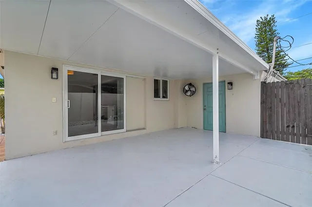 wooden floor and window in an empty room