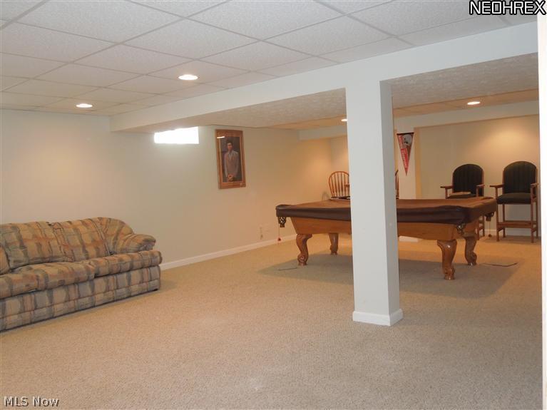 3828 Boston Road Brunswick, OH 44212 - Photo 4 of 16 Rec Room in Lower Level! Glass Block Windows! Open for many options!