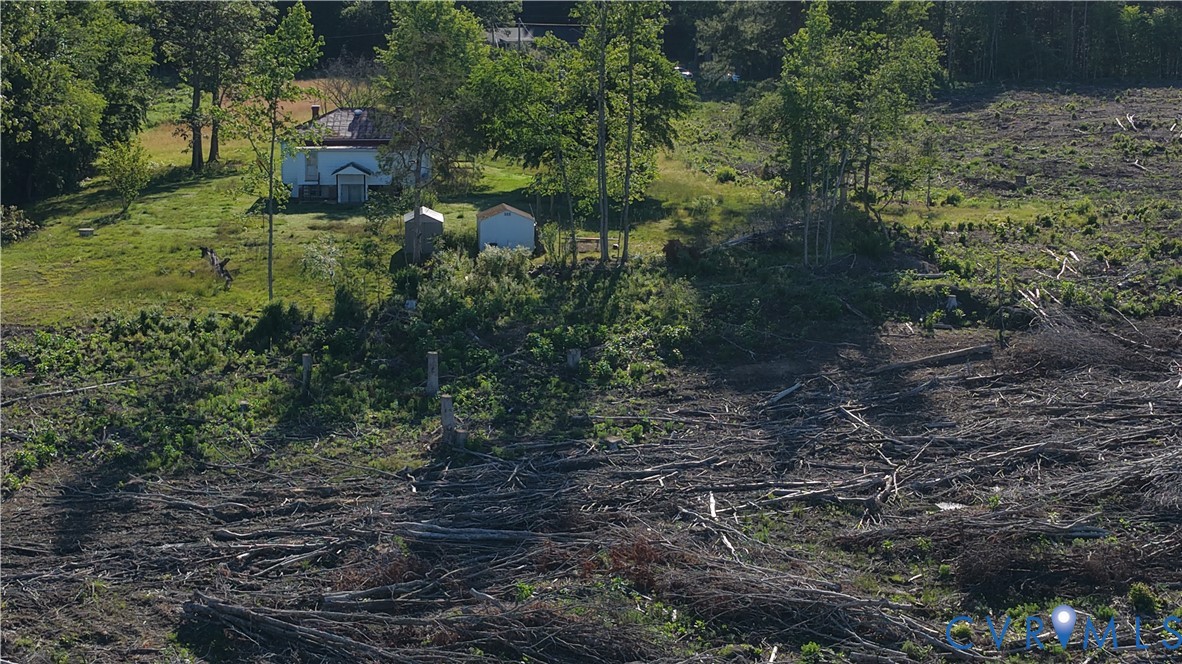 11700 Cosby Mill Road New Kent, VA 23124 - Photo 16 of 17 a view of a yard with plants and large trees