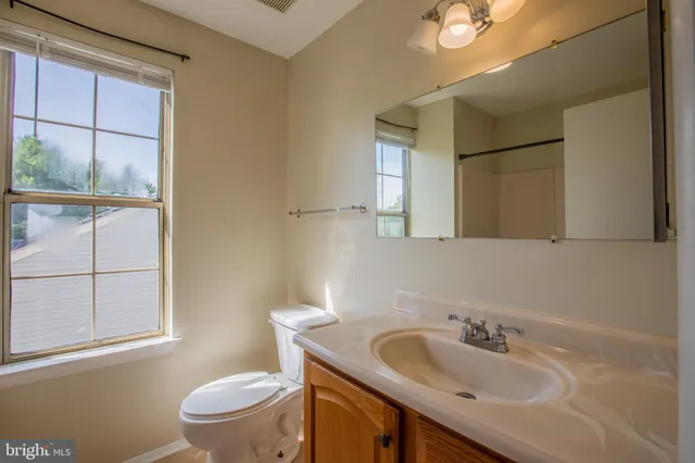 a view of a bedroom from a hallway