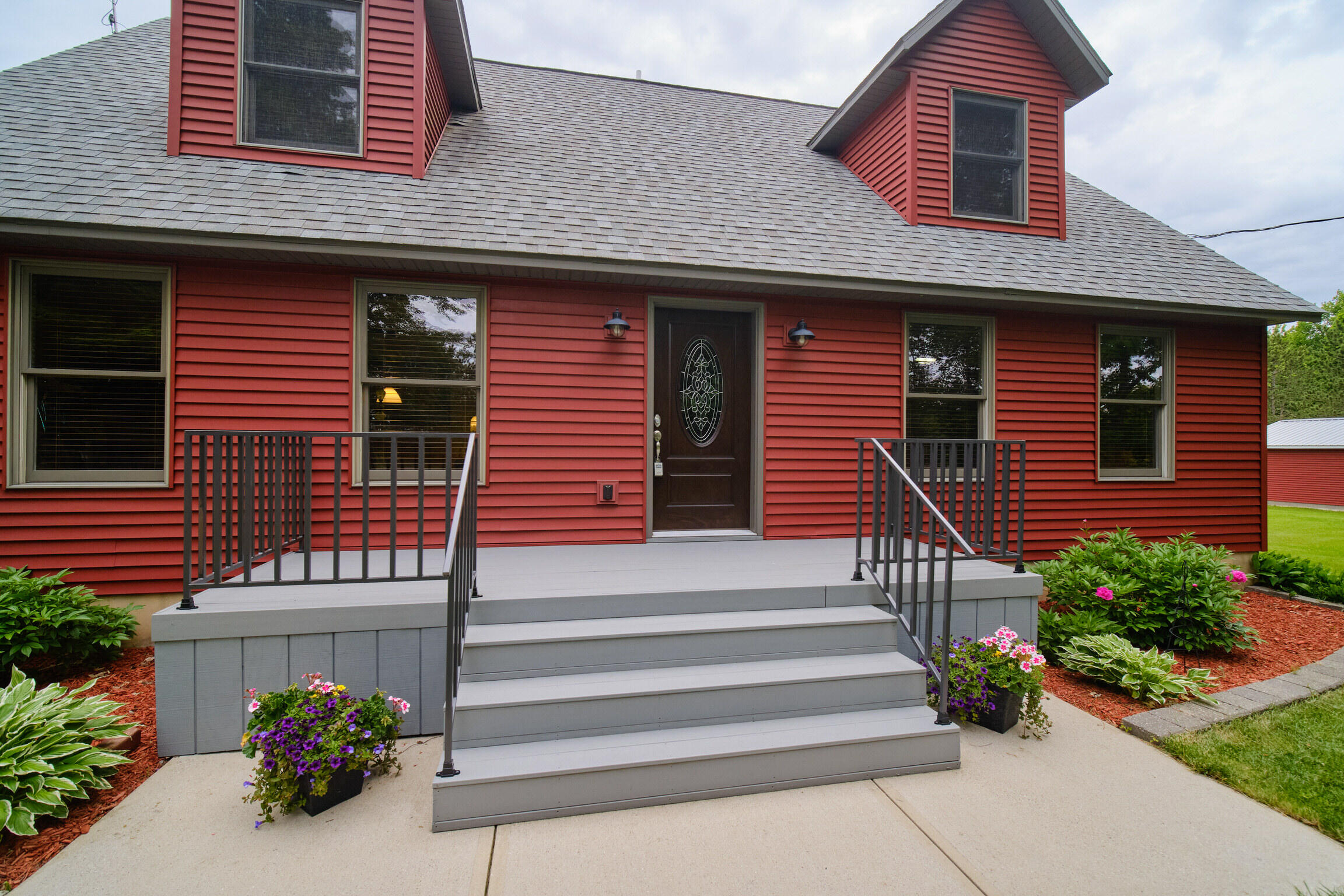 7529 North Quarterline Road Free Soil, MI 49411 - Photo 2 of 69 New front Steps/Porch