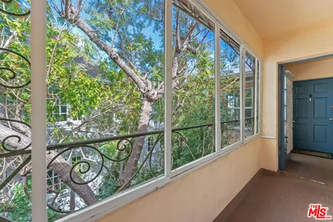 a view of a pathway of a house with a window