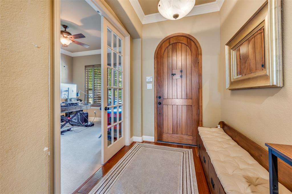 810 Redondo Irving, TX 75039 - Photo 4 of 24 Entryway featuring ornamental molding. View of the office with French doors and natural light.